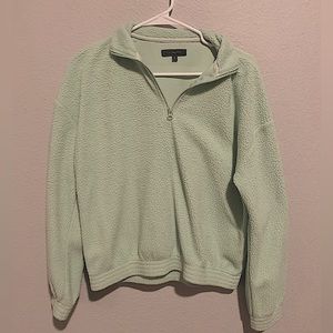 Fluffy pastel green over sized
quarter zip from pacsun
